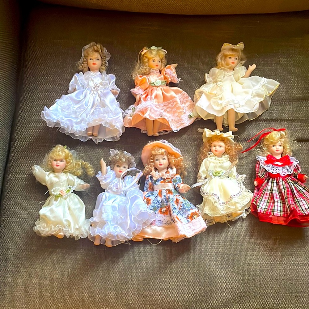VINTAGE SMALL PORCELAIN DOLLS 8 FOR 40 NO CHIPS ALL ARE INTACT NO SMOKERS HOME